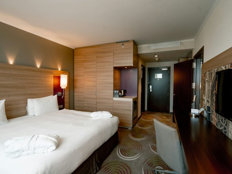 interior of a double hotel room after cleaning housekeeping bedroom rest room